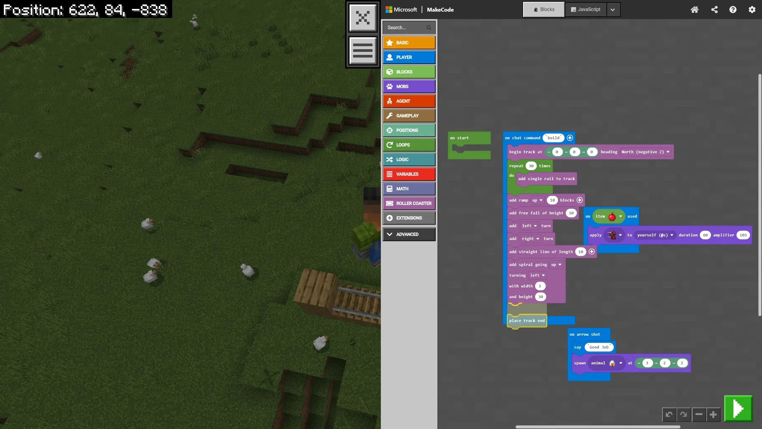 Split screen of Minecraft Education: the game world with rails and chickens on the left, and the Microsoft MakeCode block editor on the right showing an ‘on chat command build’ script with loops that lay track, add a ramp and spiral, and spawn an animal